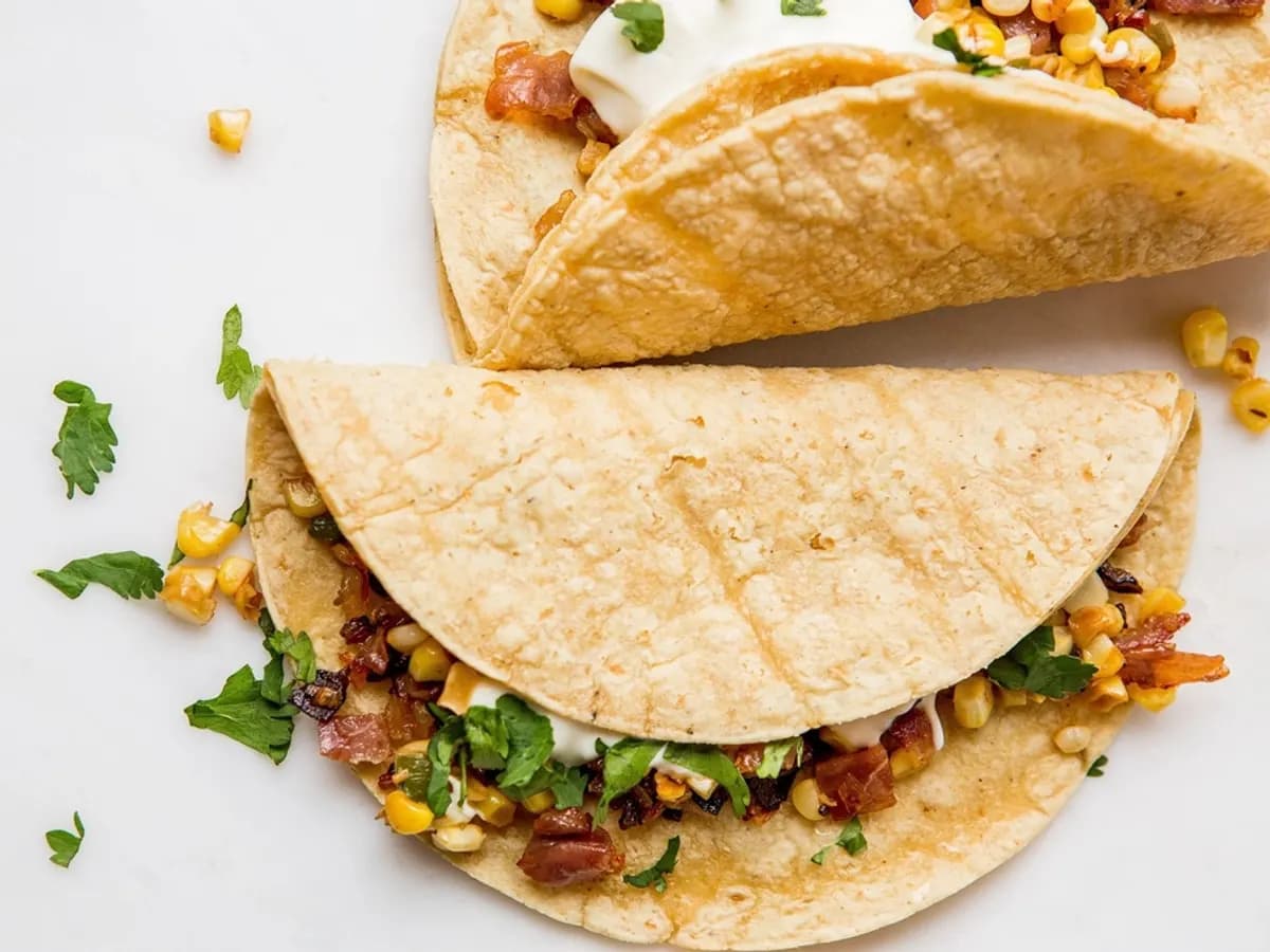 Bean and corn tacos in soft tortillas