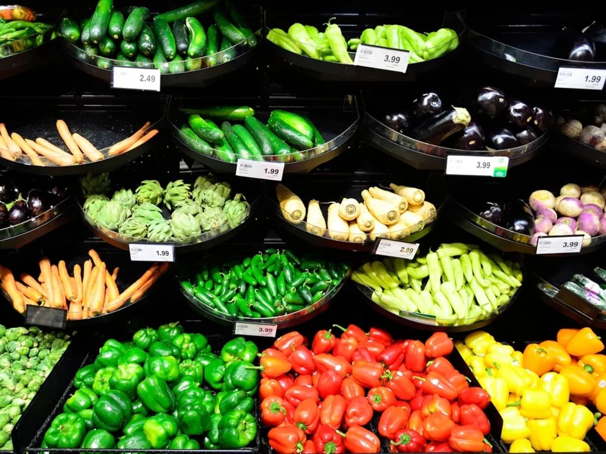 Fresh vegetables on supermarket shelves
